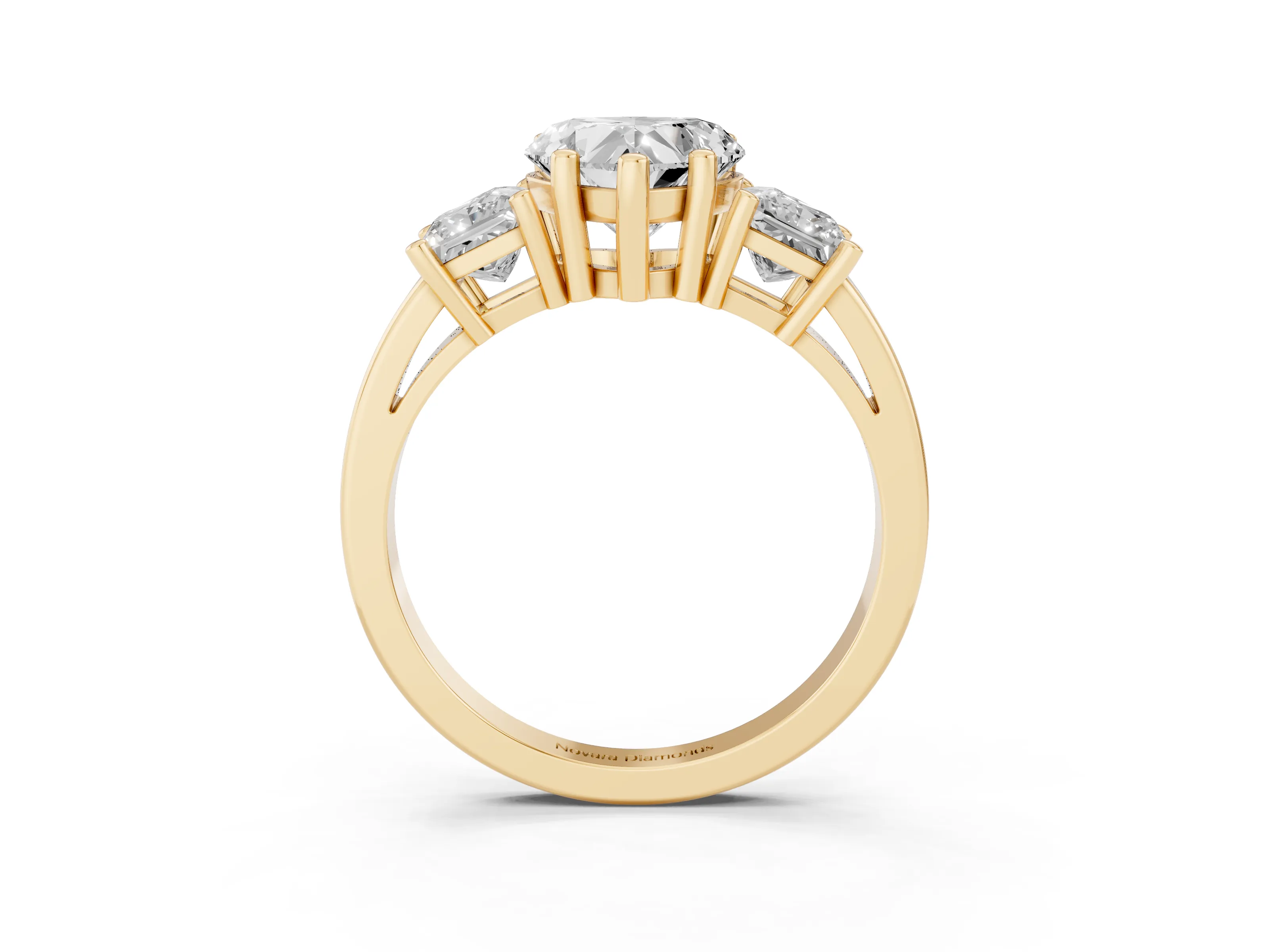 Three-Stone Heart Cut Diamond Solitaire Ring Set in Yellow gold with Prong Setting
