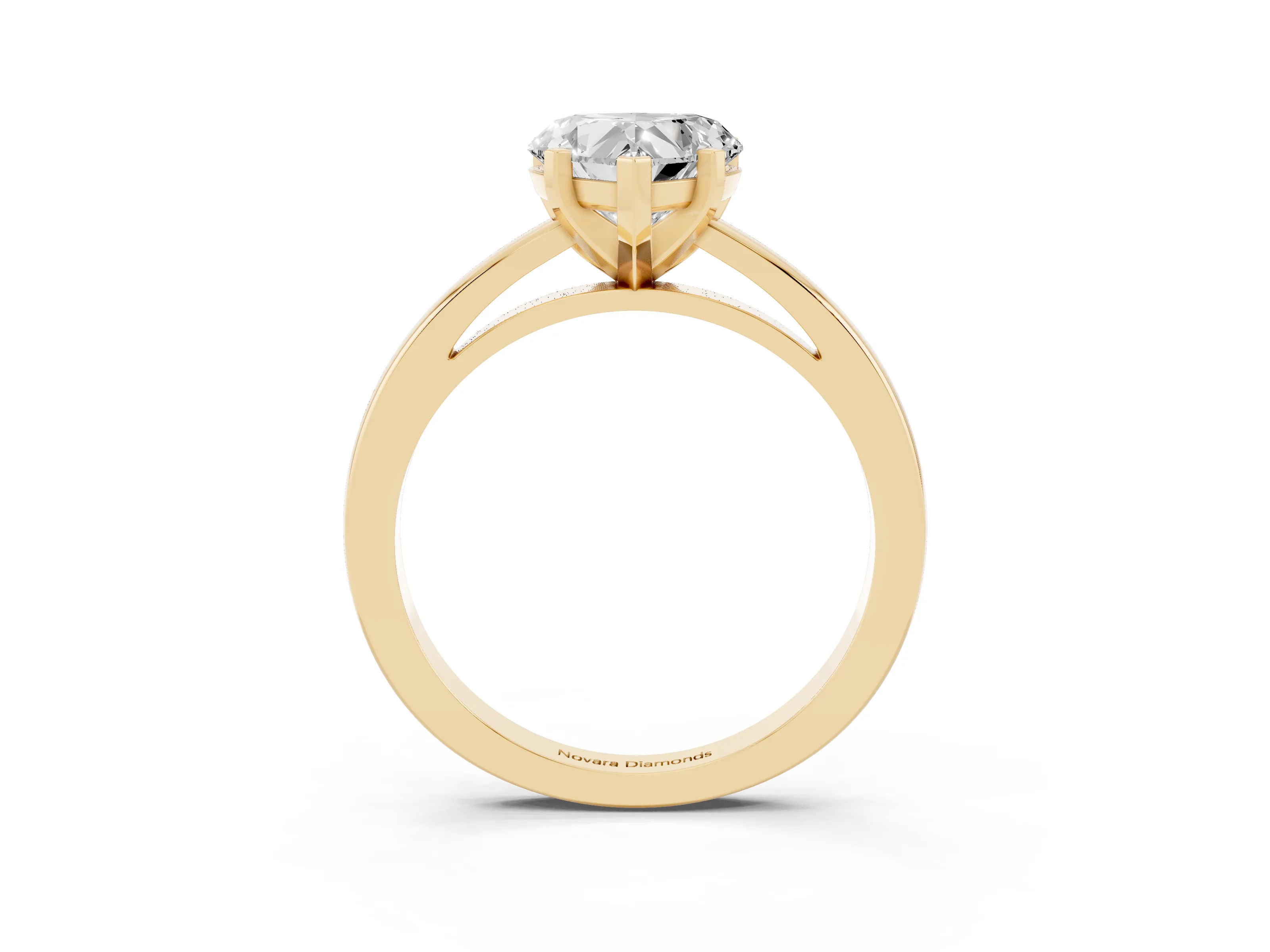 Heart Cut Diamond Solitaire Engagement Ring Set in Yellow gold with Prong Setting on a Classic Band