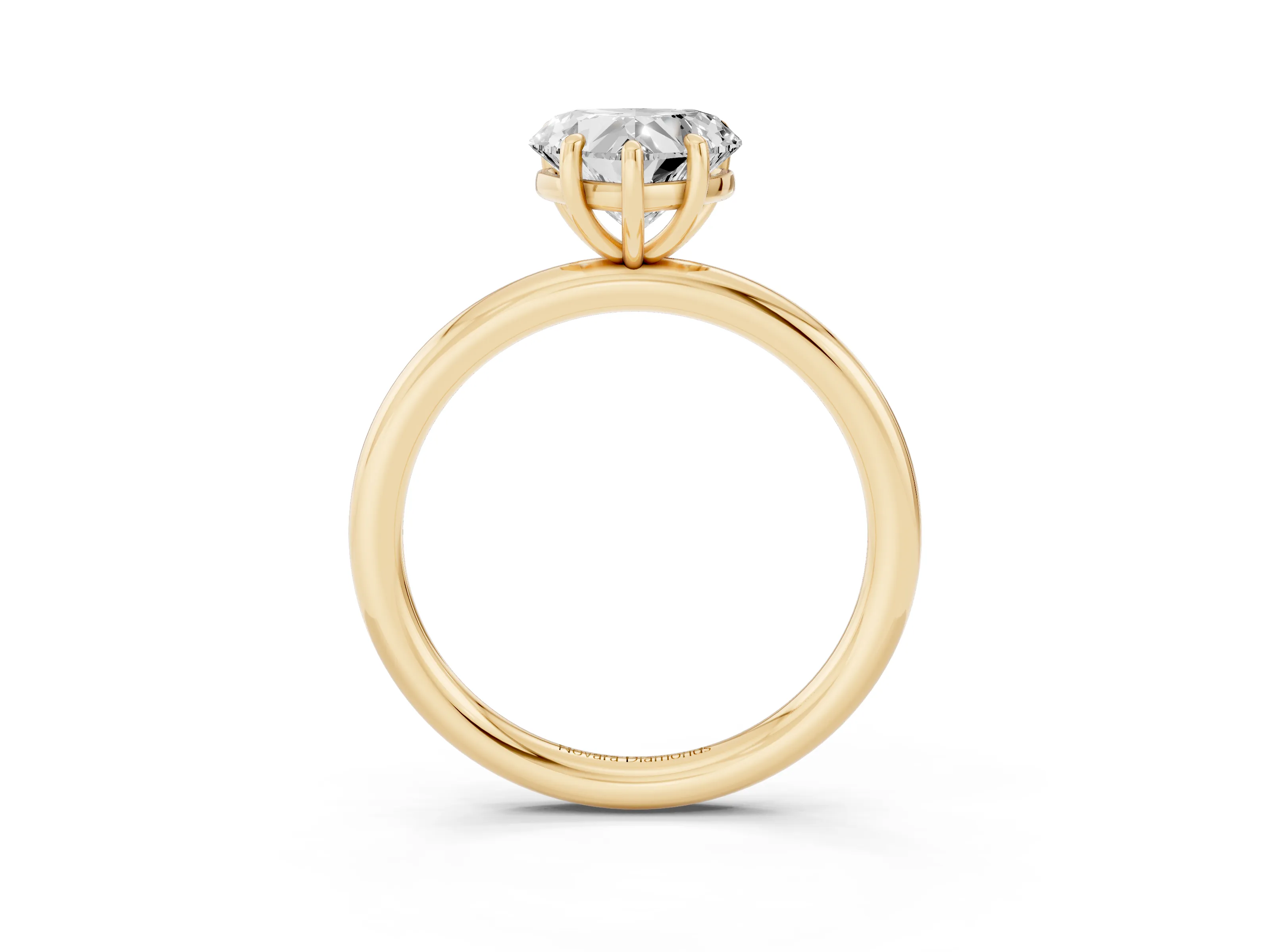 Heart Cut Diamond Solitaire Ring Set in Yellow gold with Prong Setting on a Polished Plain Band