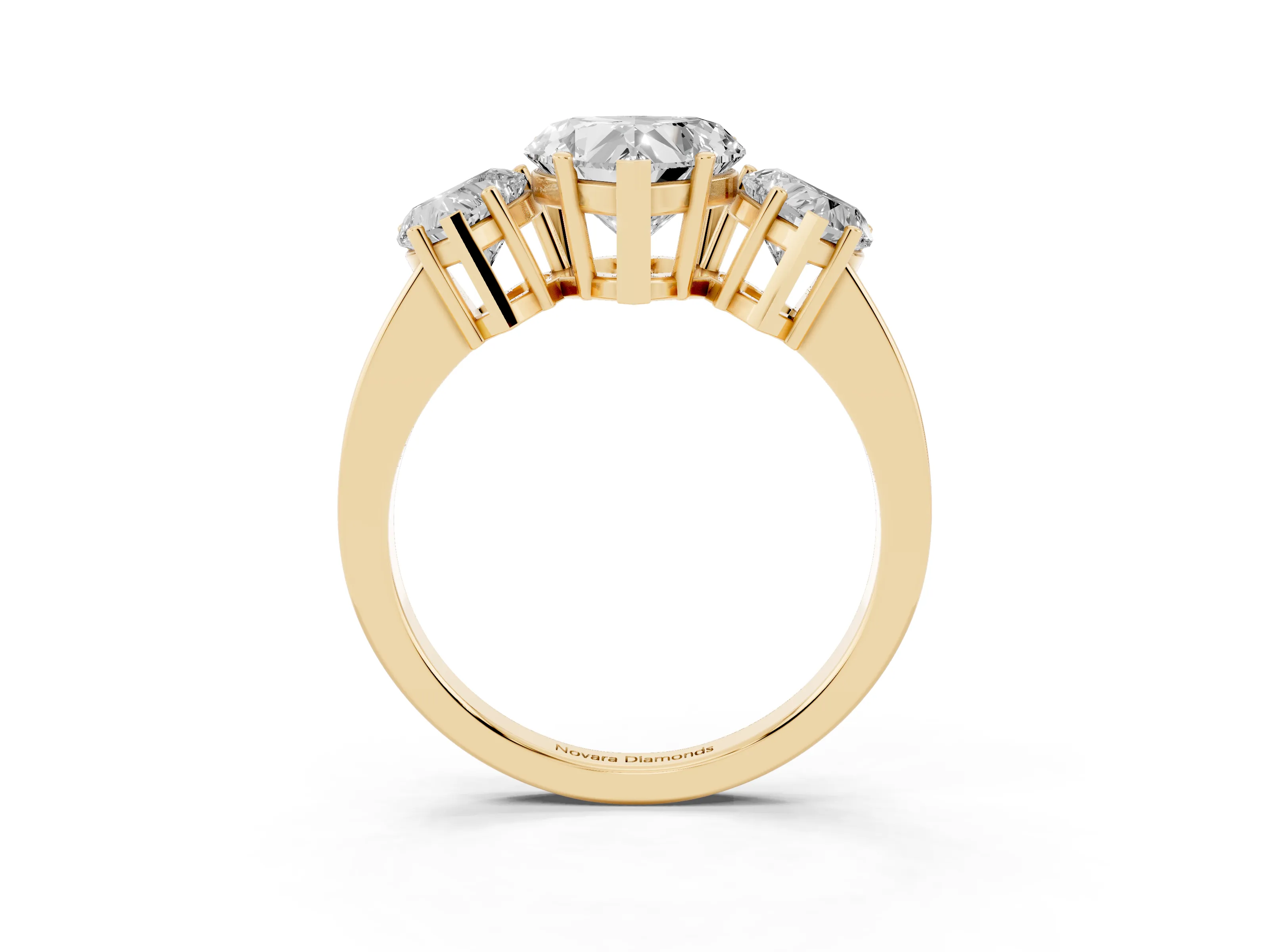 Heart Cut Diamond Three-Stone Engagement Ring Set in Yellow gold with Flat Band