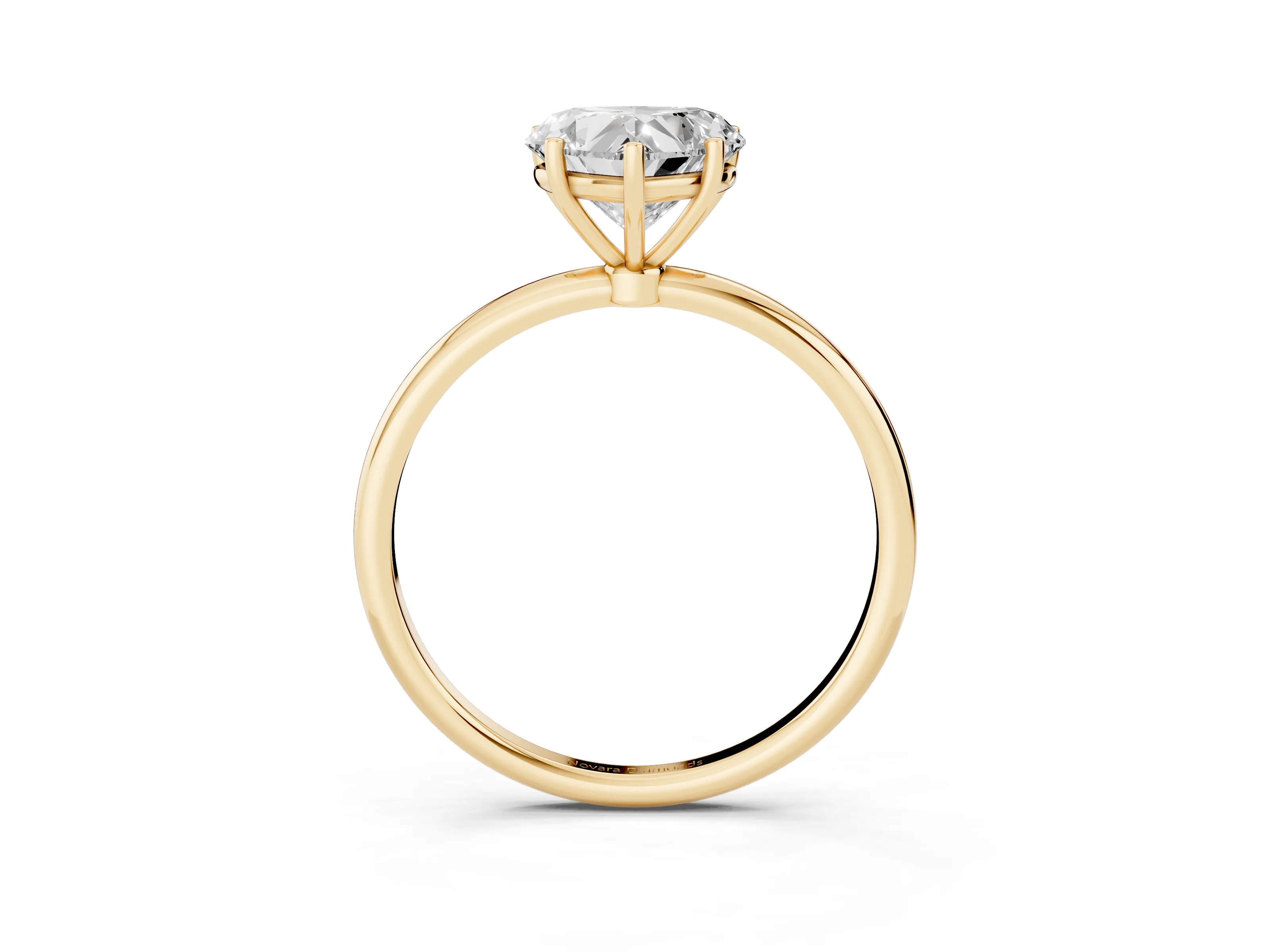 Heart Cut Diamond Solitaire Engagement Ring Set in Yellow gold with Thin Band and Prong Setting