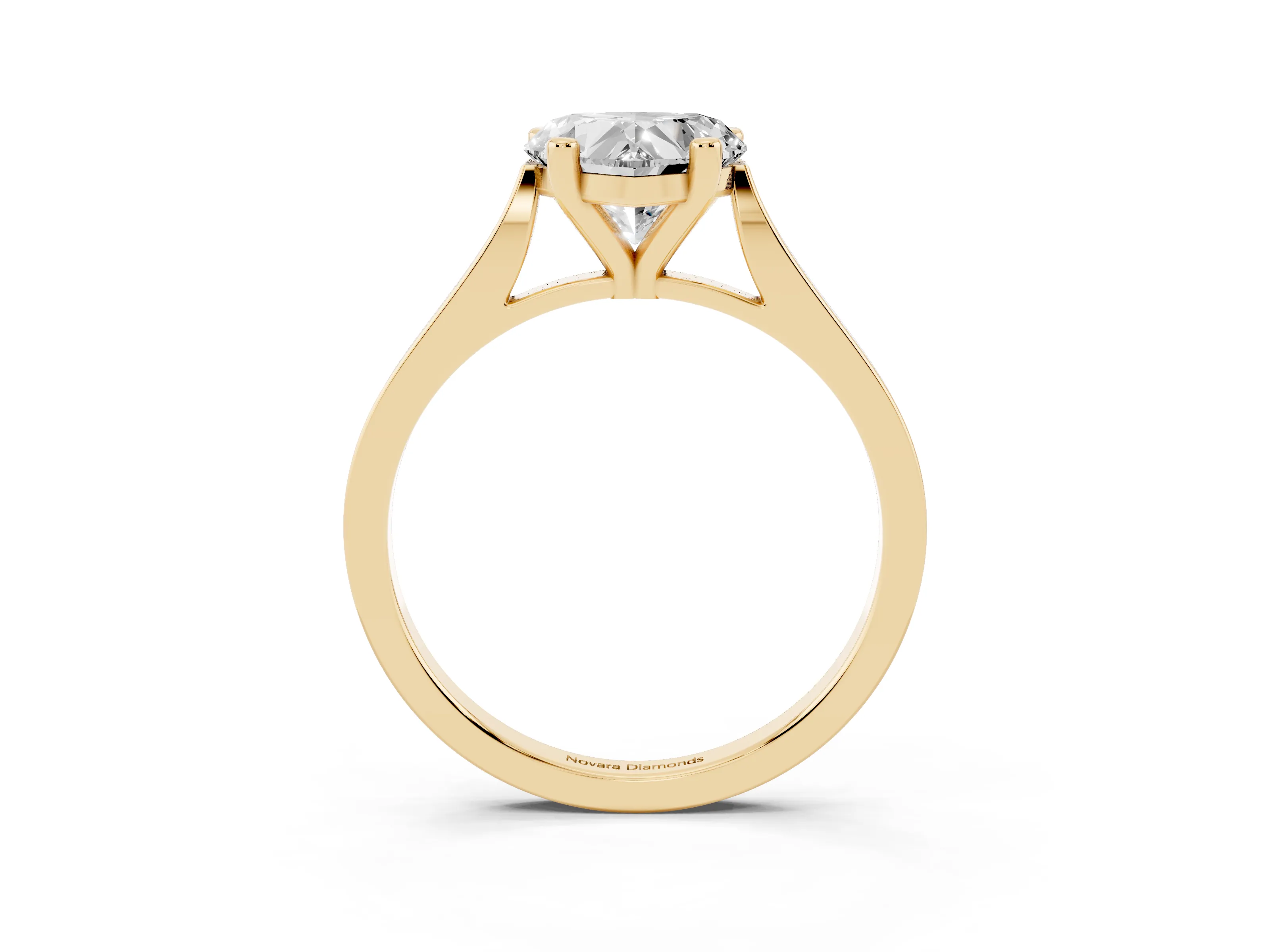 Heart Cut Diamond Solitaire Ring Set in Yellow gold with Prong Setting and Tapered Band