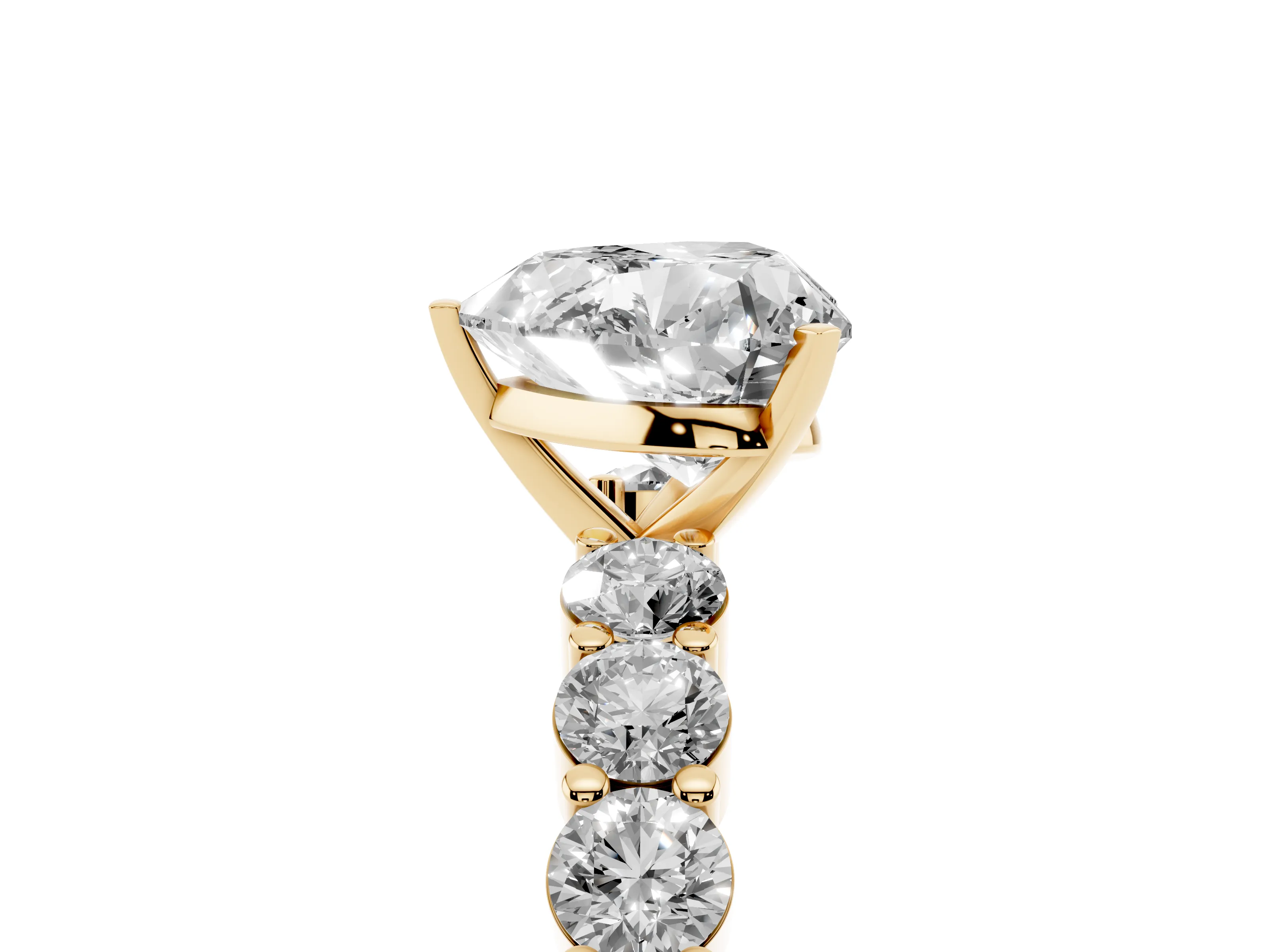 Heart Cut Diamond Solitaire Ring Set in Yellow gold with Shared Prong Round Side Stones