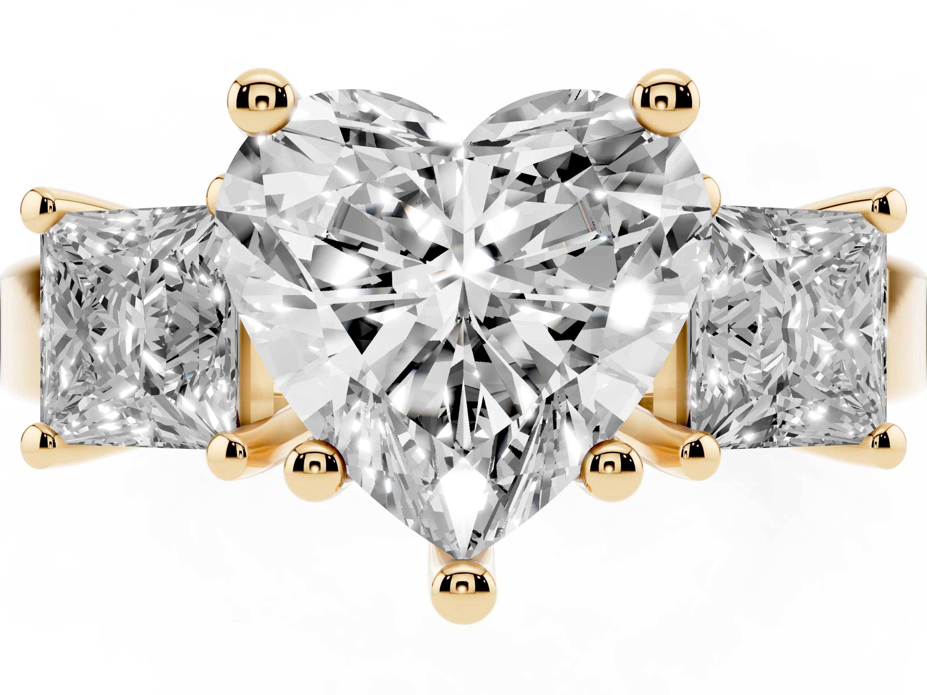 Three-Stone Heart Cut Diamond Solitaire Ring Set in Yellow gold with Prong Setting