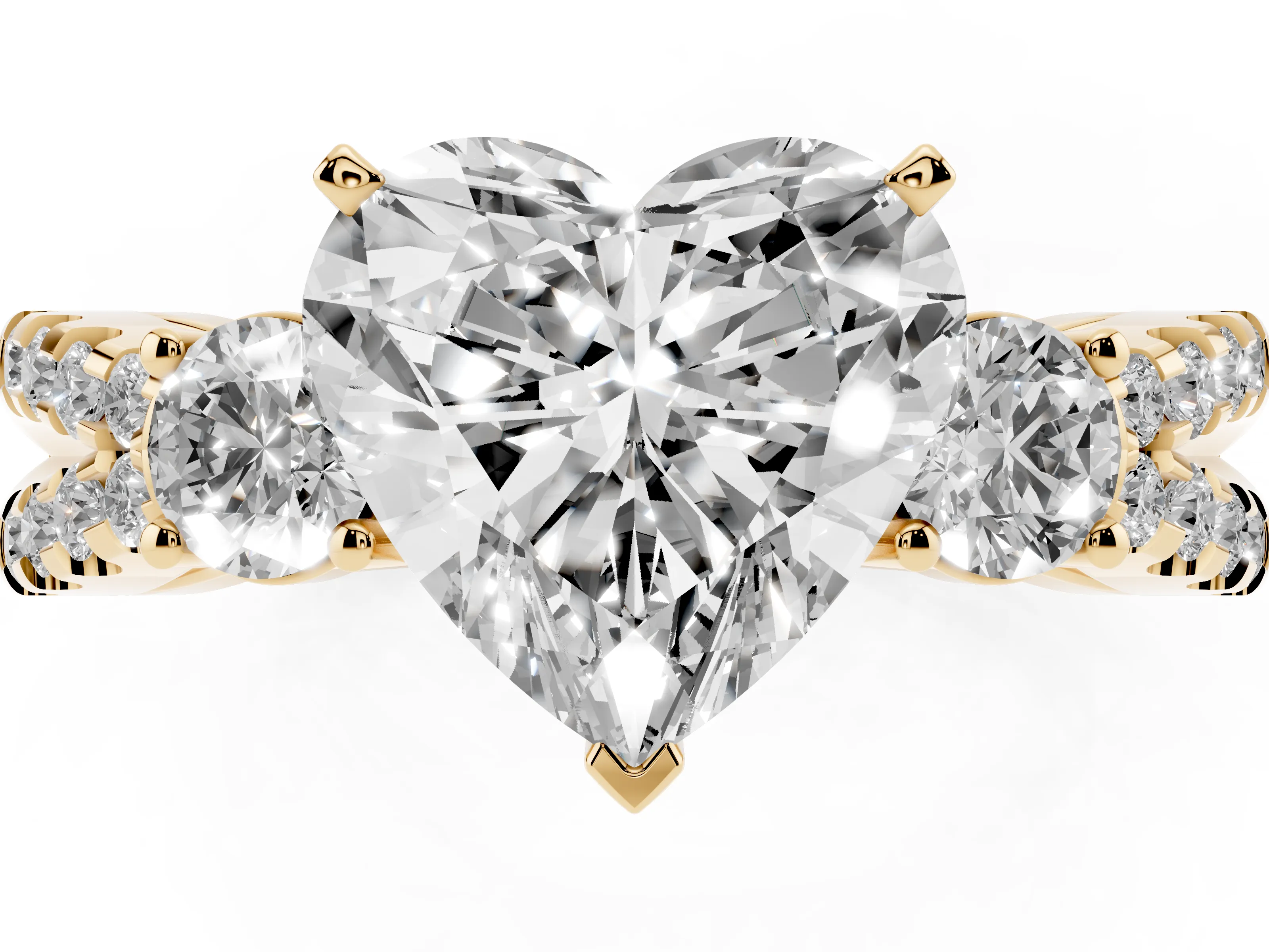 Heart Cut Diamond Three-Stone Ring Set in Yellow gold with Pavé Split Shank and Prong Setting
