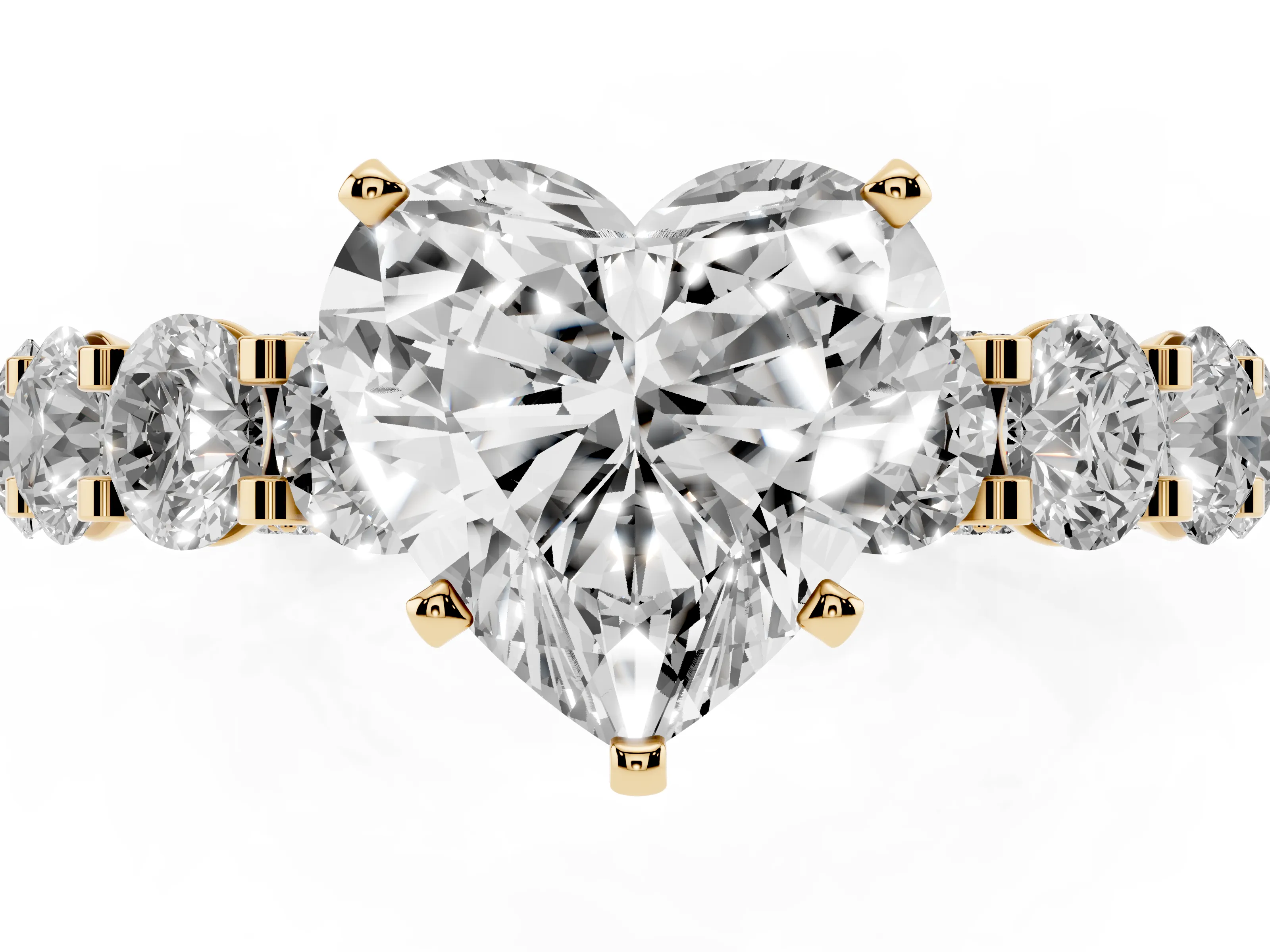 Heart Cut Diamond Side Stone Ring Set in Yellow gold with Alternating Round and Oval Side Stones