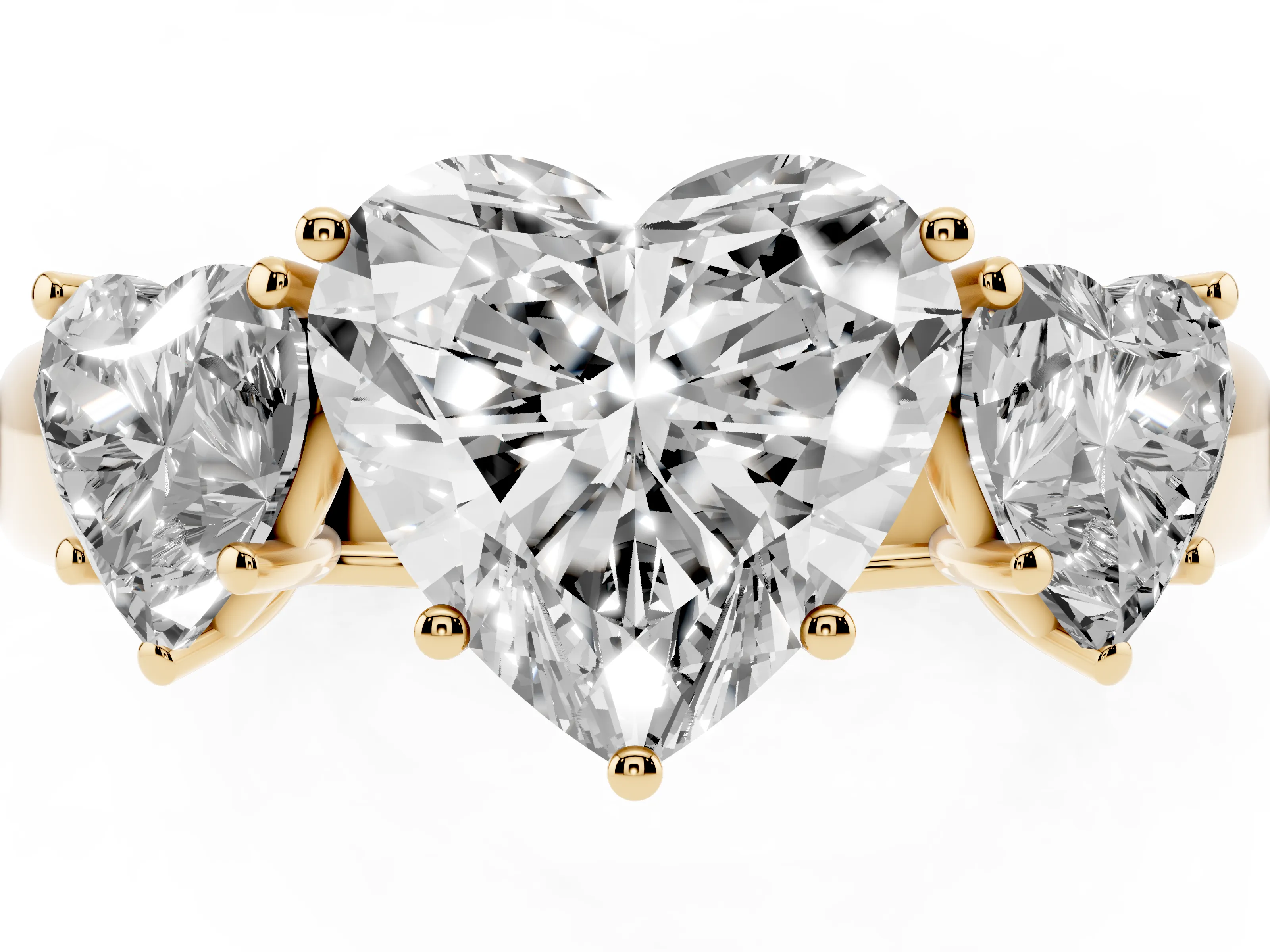 Three-Stone Heart Cut Diamond Ring Set in Yellow gold with Matching Prong Settings and Plain Band