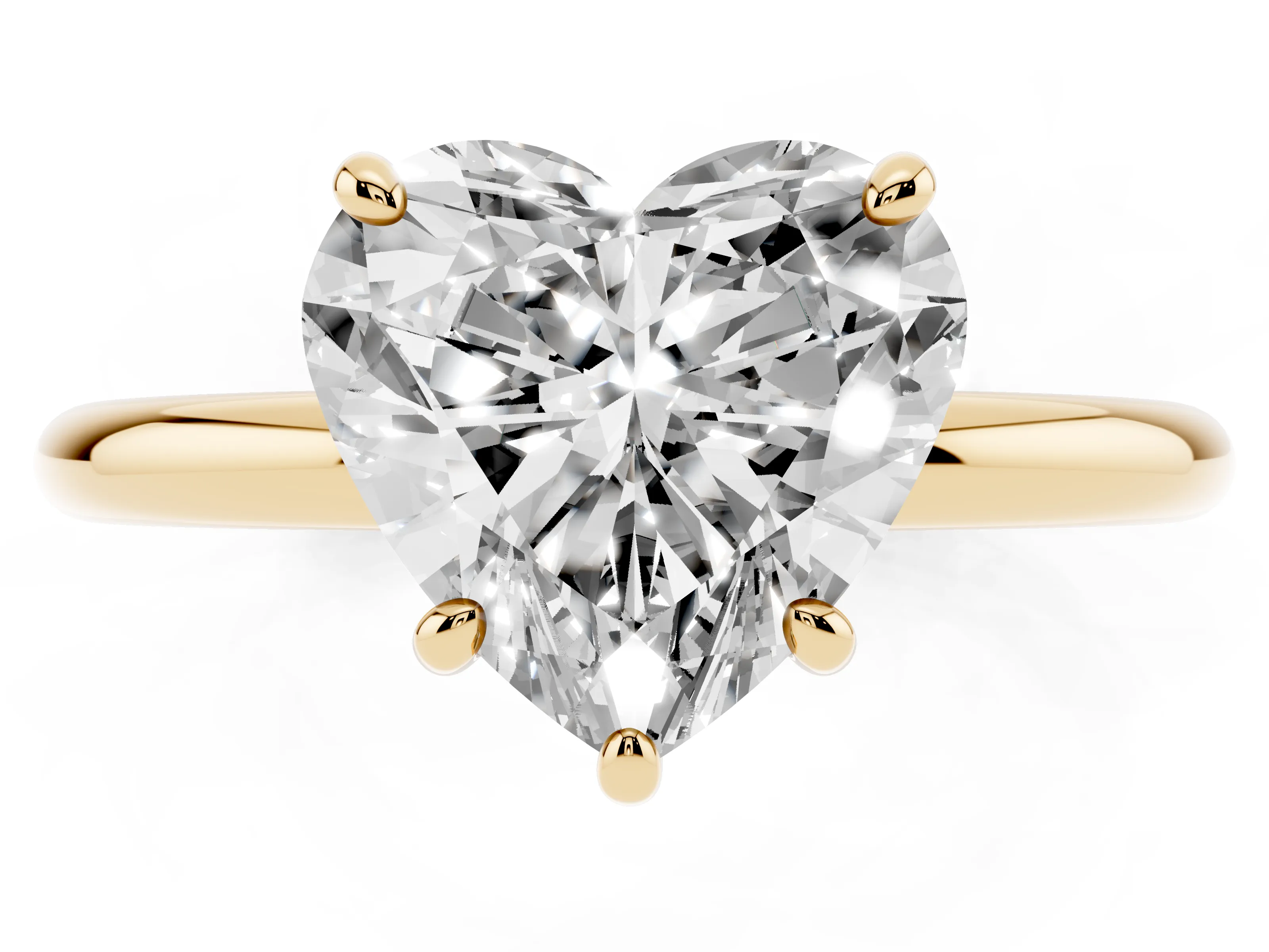 Heart Cut Diamond Solitaire Ring Set in Yellow gold with Prong Setting on a Polished Plain Band