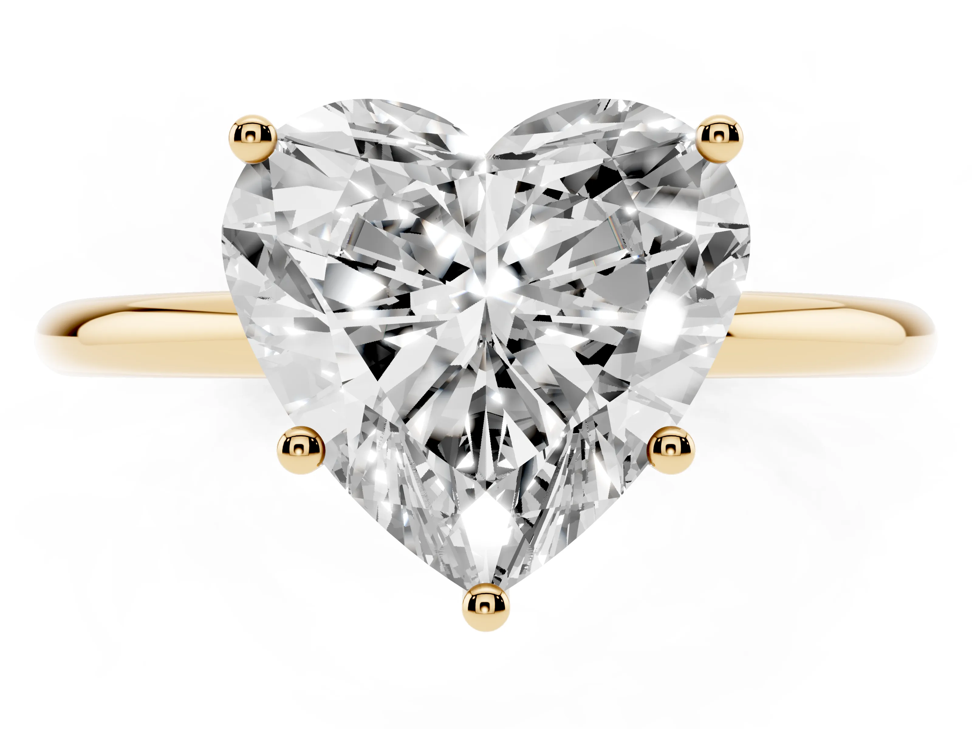 Heart Cut Diamond Solitaire Engagement Ring Set in Yellow gold with Thin Band and Prong Setting