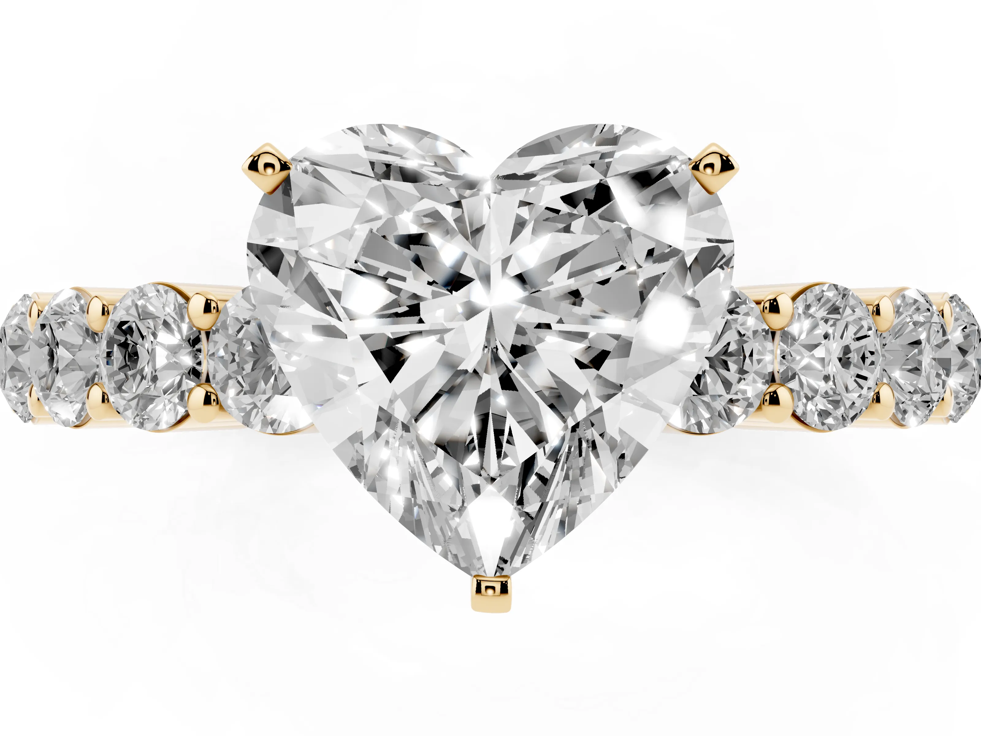 Heart Cut Diamond Solitaire Ring Set in Yellow gold with Shared Prong Round Side Stones