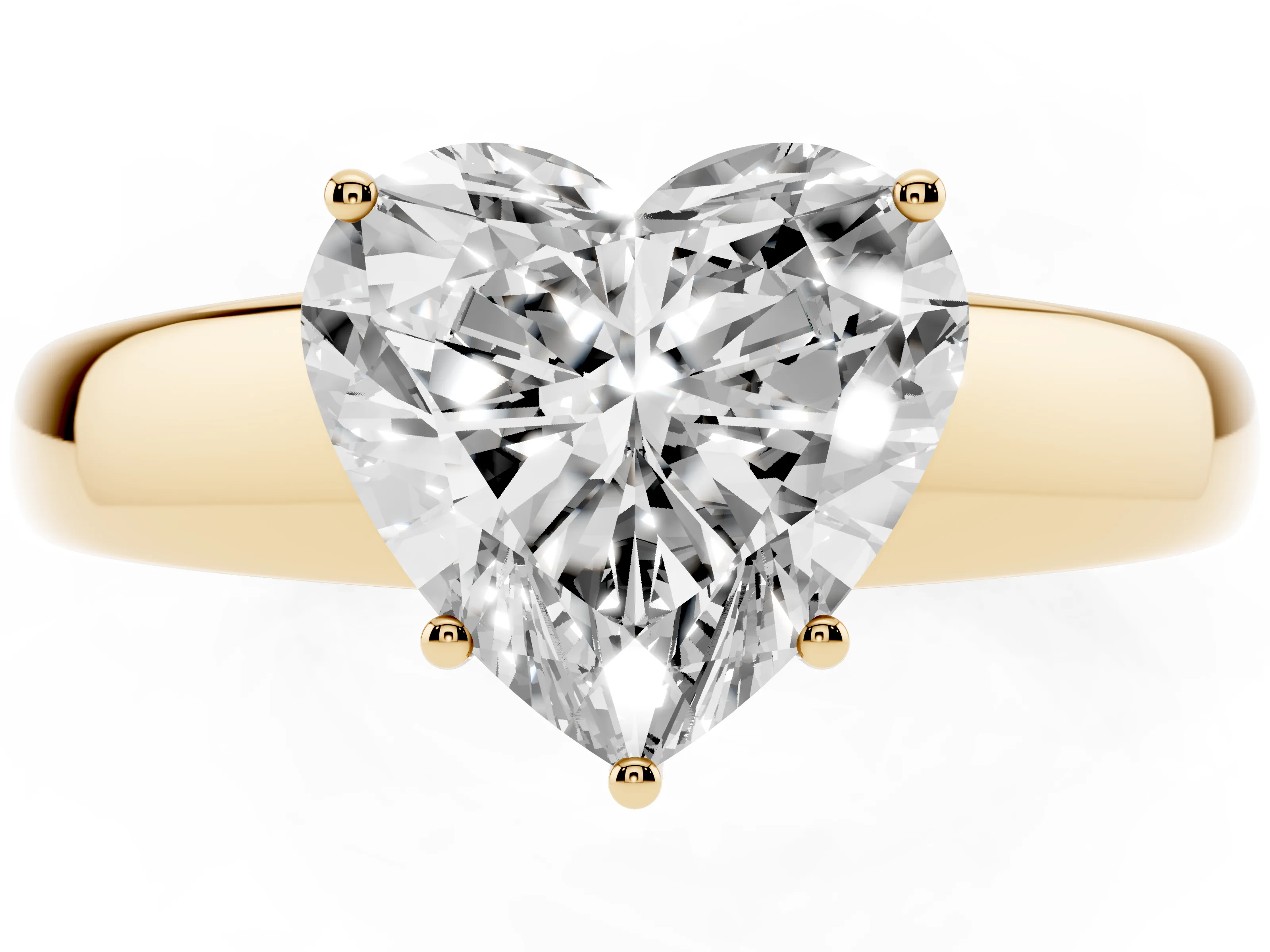 Heart Cut Diamond Solitaire Ring Set in Yellow gold with Tapered Band and Prong Setting