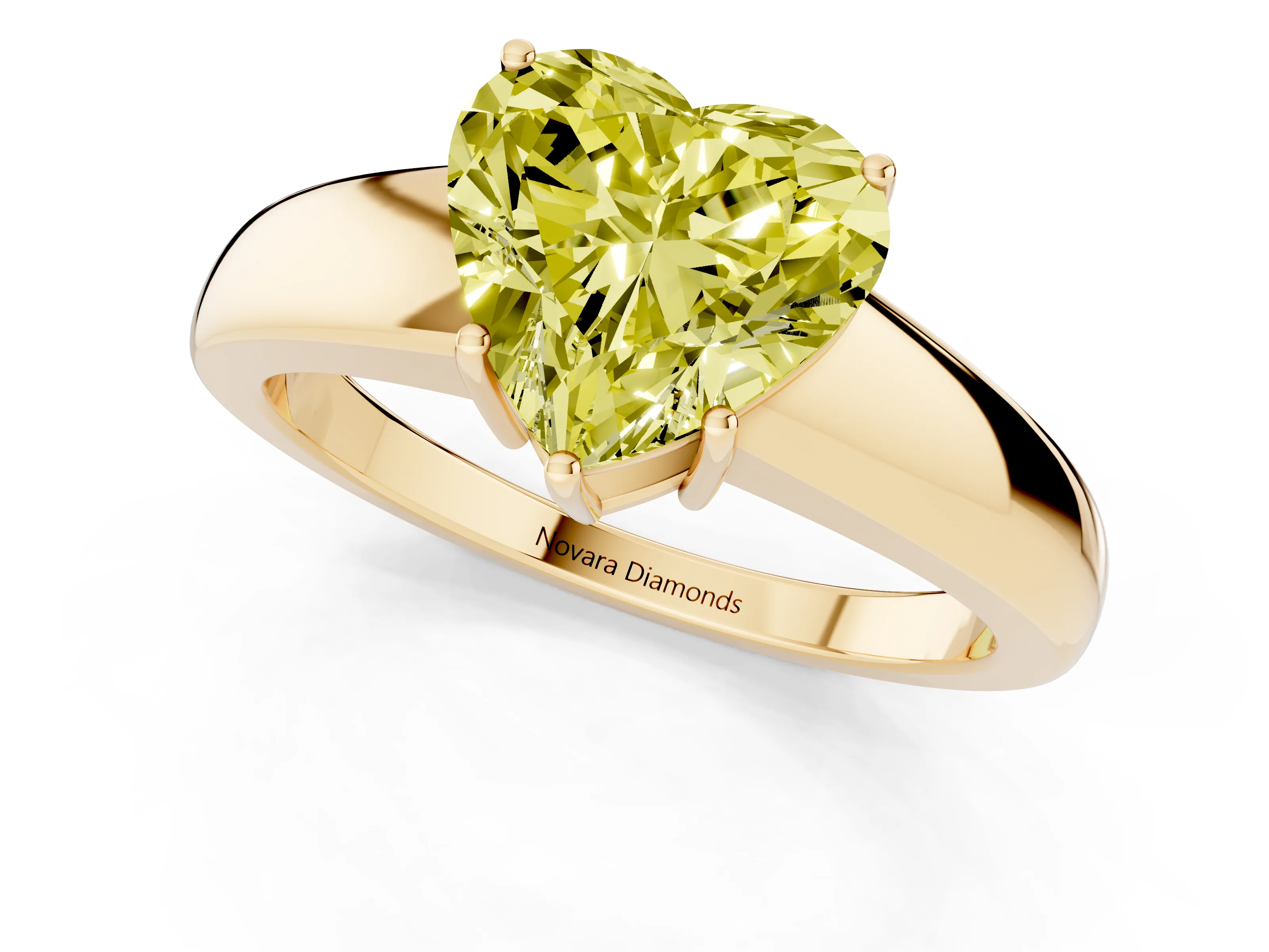 Fancy Yellow Heart Cut Diamond Solitaire Ring Set in Yellow gold with Tapered Band and Prong Setting