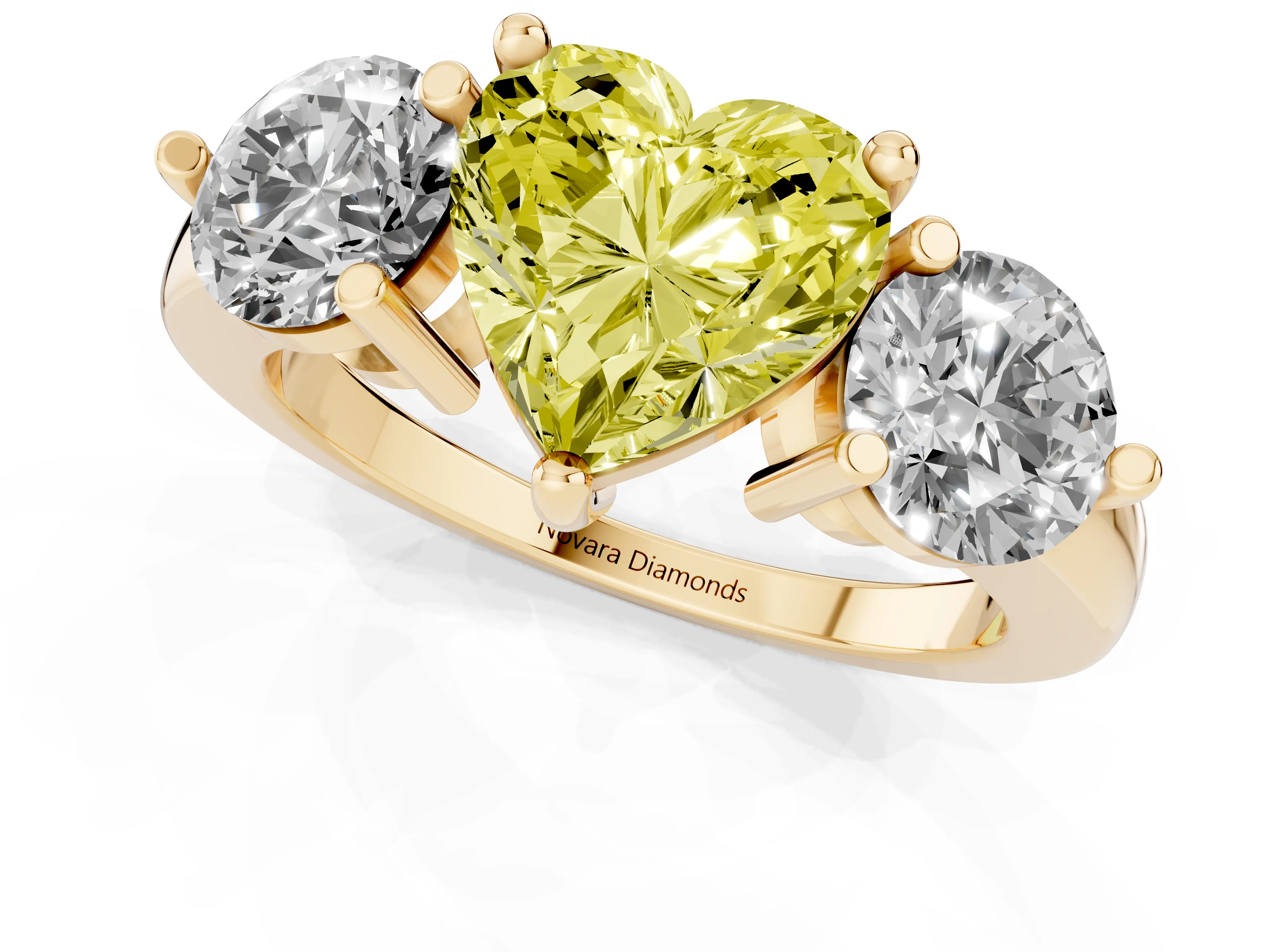 Fancy Yellow Heart Cut Diamond Three-Stone Ring Set in Yellow gold with Prong Setting and Classic Band