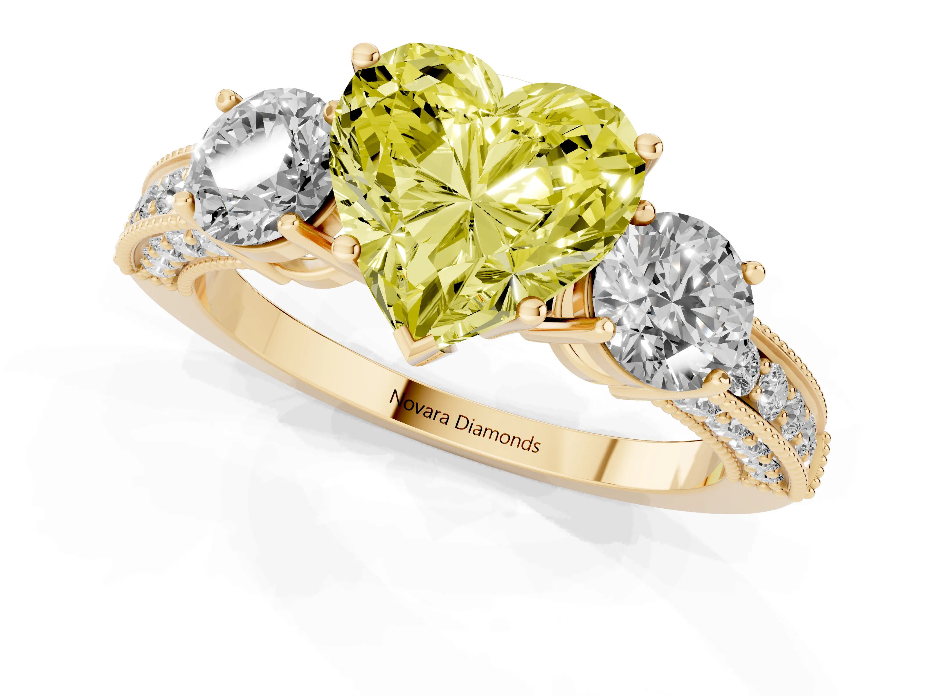 Fancy Yellow Heart Cut Diamond Three-Stone Ring Set in Yellow gold with Round Side Stones and Pavé Band