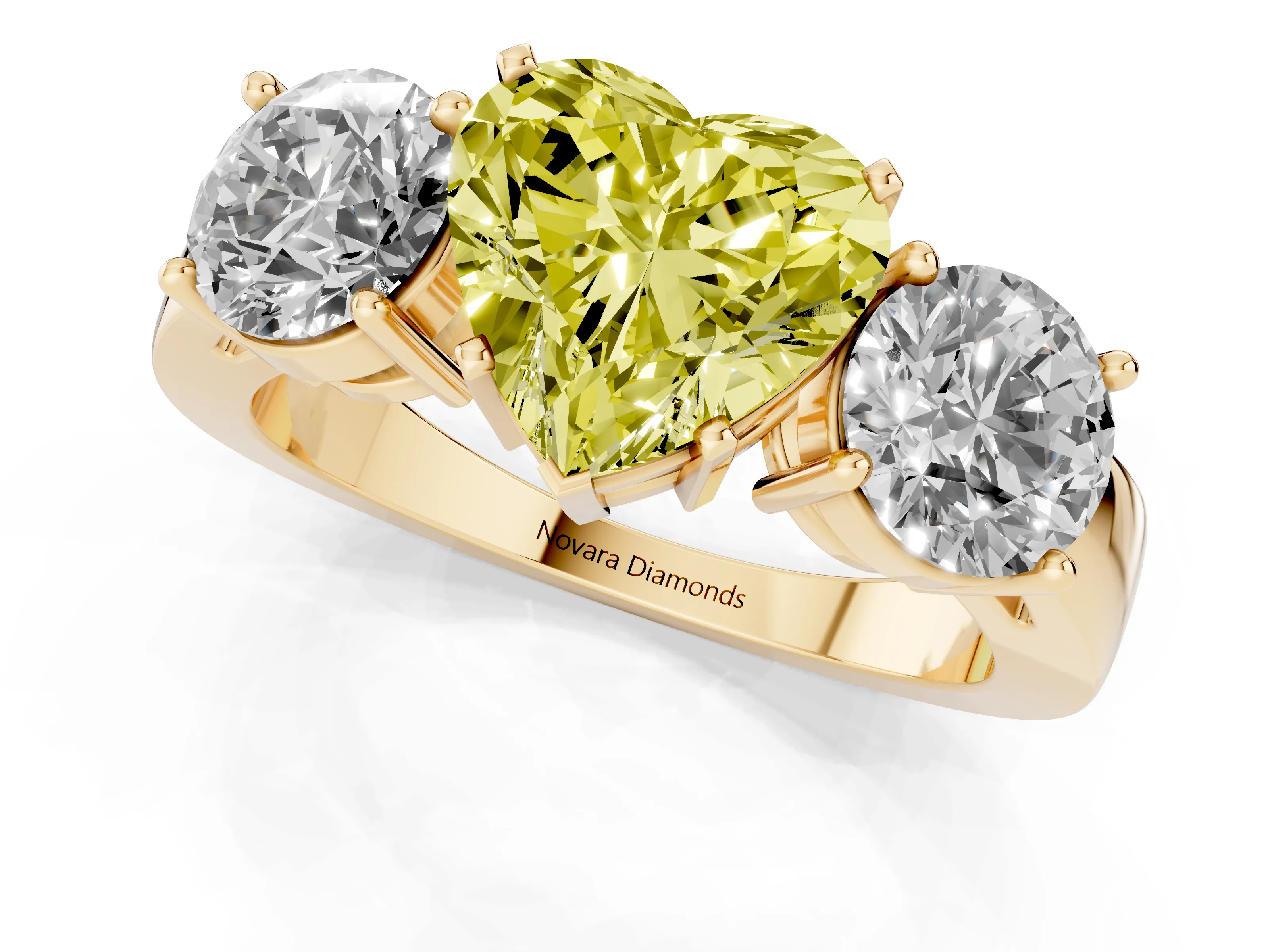 Fancy Yellow Heart Cut Diamond Three-Stone Ring Set in Yellow gold with Round Side Stones and Classic Band