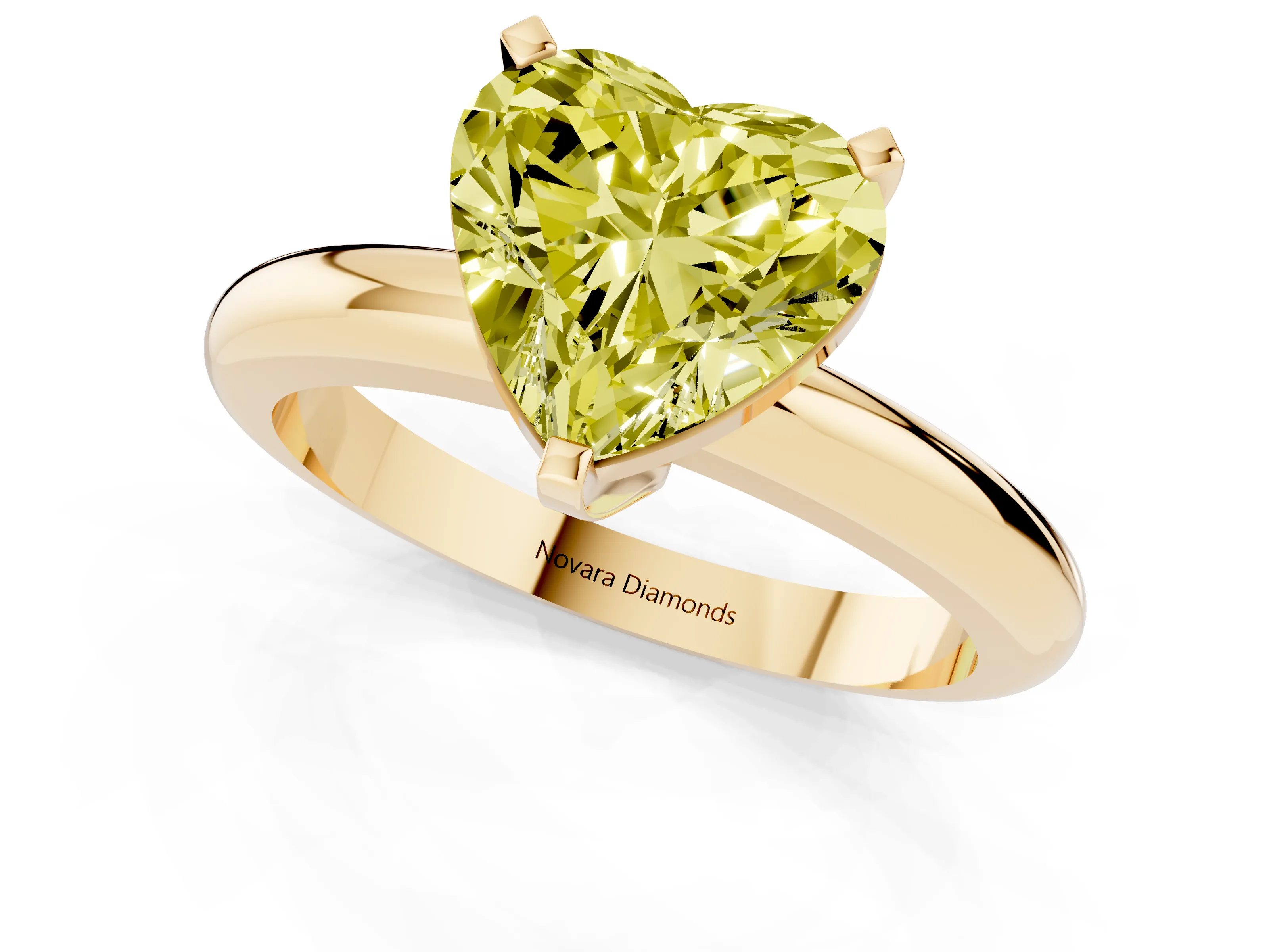 Fancy Yellow Heart Cut Diamond Solitaire Engagement Ring Set in Yellow gold with Round Band and Prong Setting