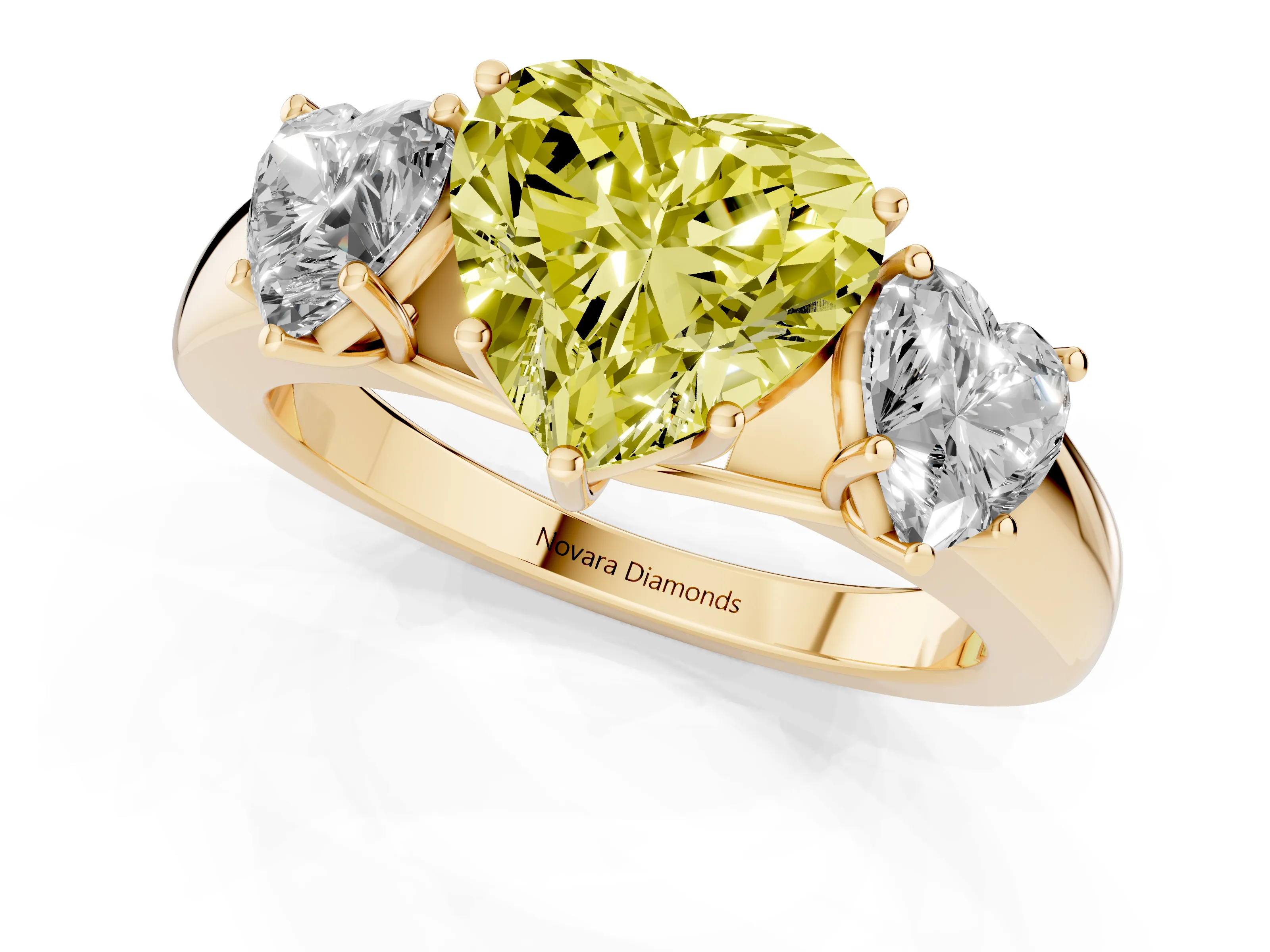 Fancy Yellow Three-Stone Heart Cut Diamond Ring Set in Yellow gold with Matching Prong Settings and Plain Band