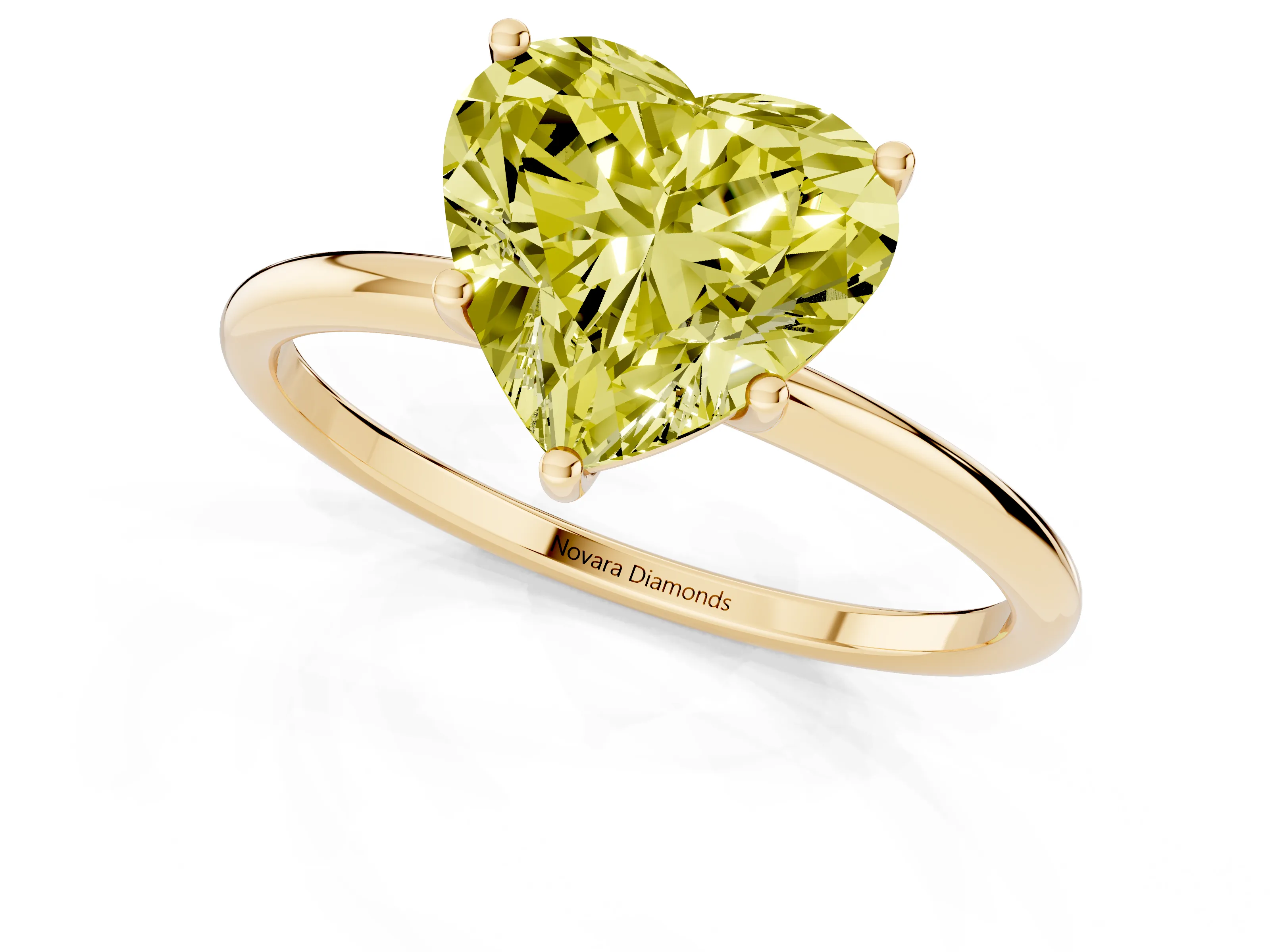 Fancy Yellow Heart Cut Diamond Solitaire Engagement Ring Set in Yellow gold with Thin Band and Prong Setting