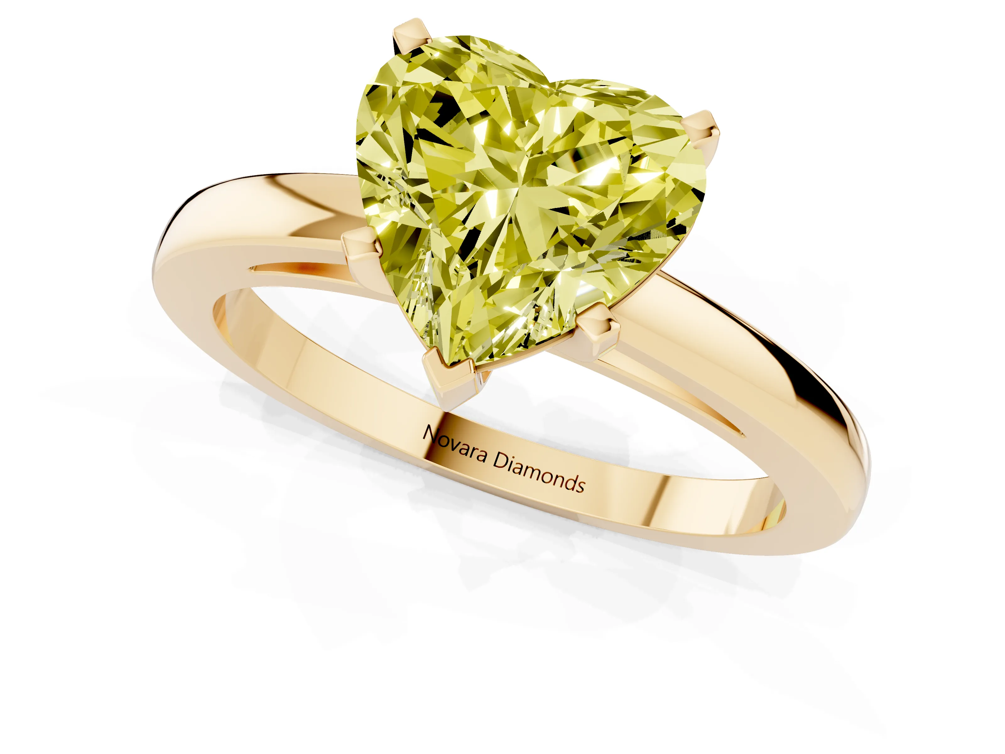 Fancy Yellow Heart Cut Diamond Solitaire Engagement Ring Set in Yellow gold with Prong Setting on a Classic Band