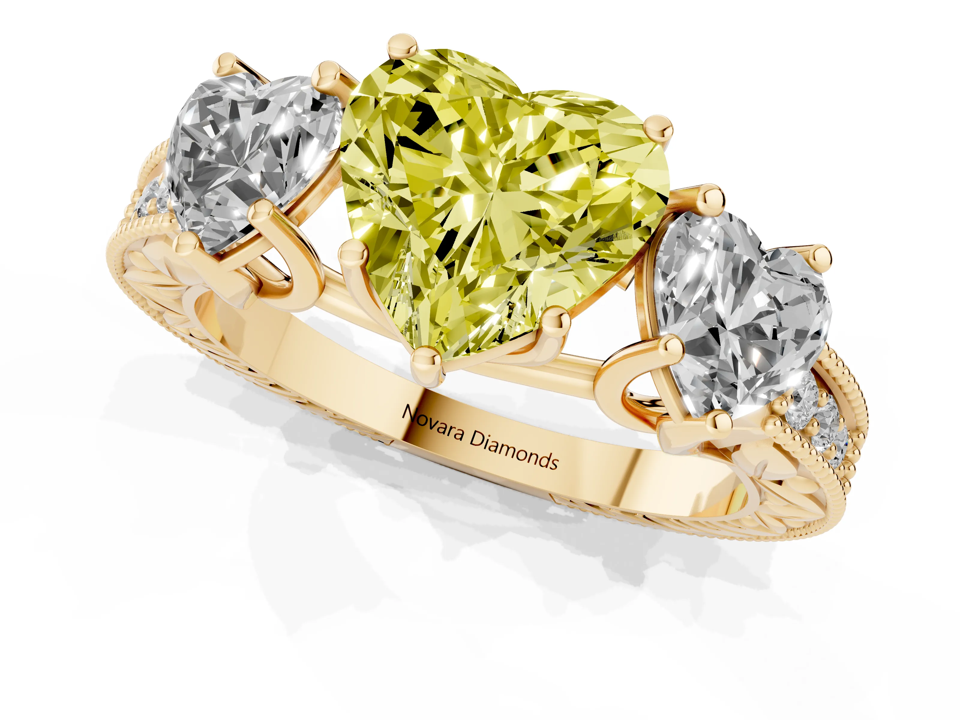 Fancy Yellow Heart Cut Diamond Three-Stone Engagement Ring Set in Yellow gold with Milgrain Pavé Band