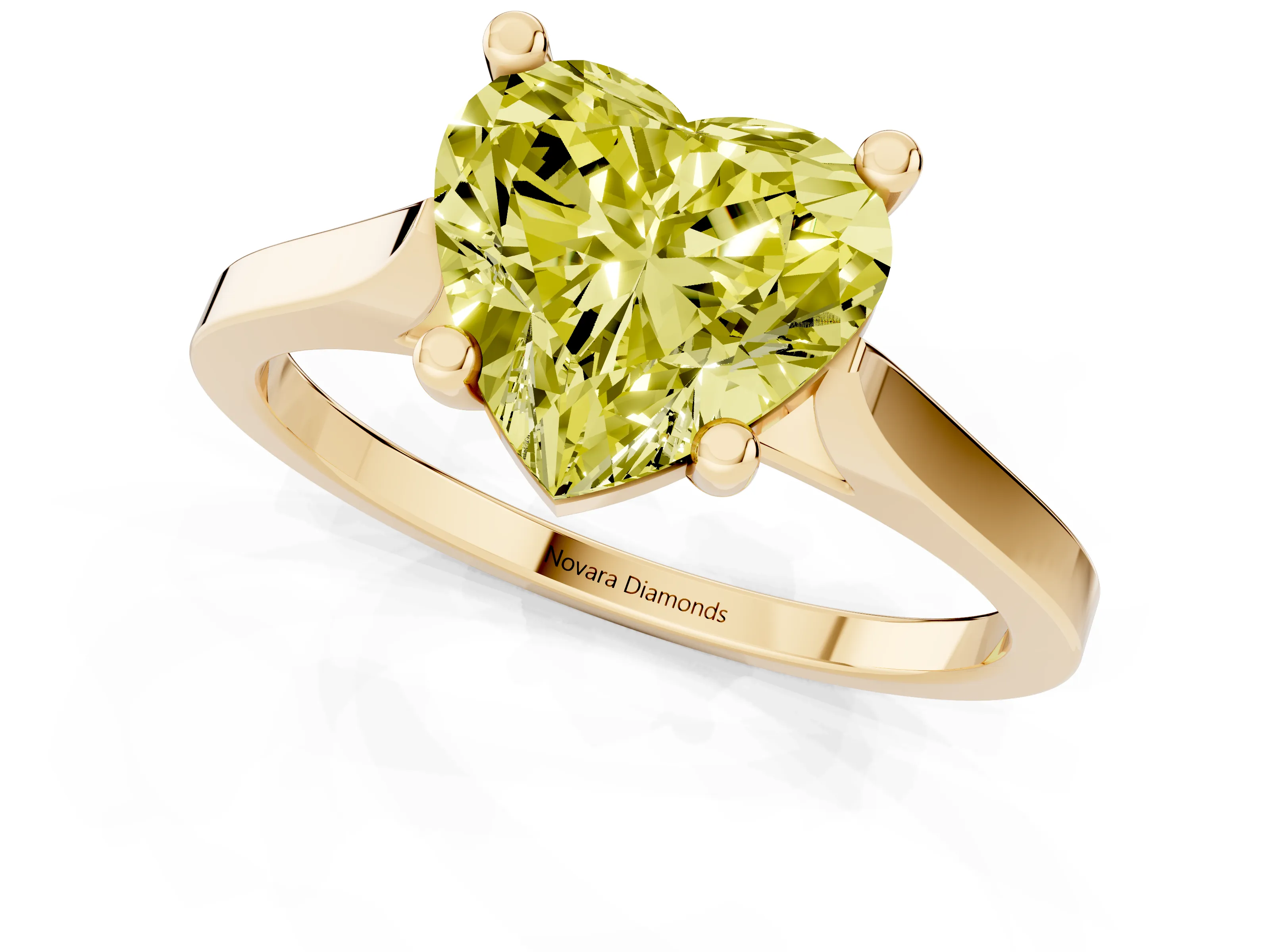 Fancy Yellow Heart Cut Diamond Solitaire Ring Set in Yellow gold with Prong Setting and Tapered Band