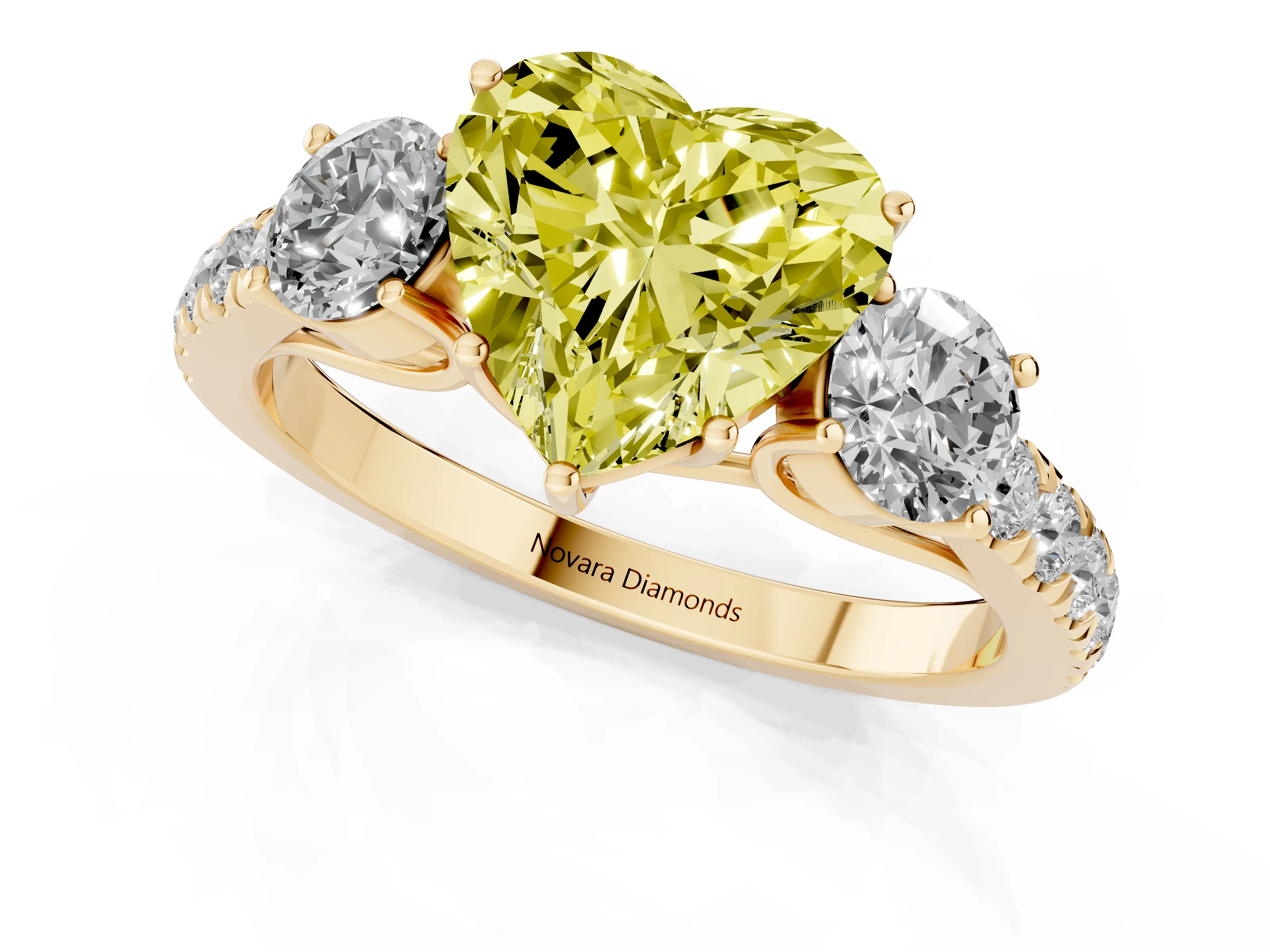 Fancy Yellow Heart Cut Diamond Three-Stone Ring Set in Yellow gold with Round Side Stones and Delicate Pavé Band