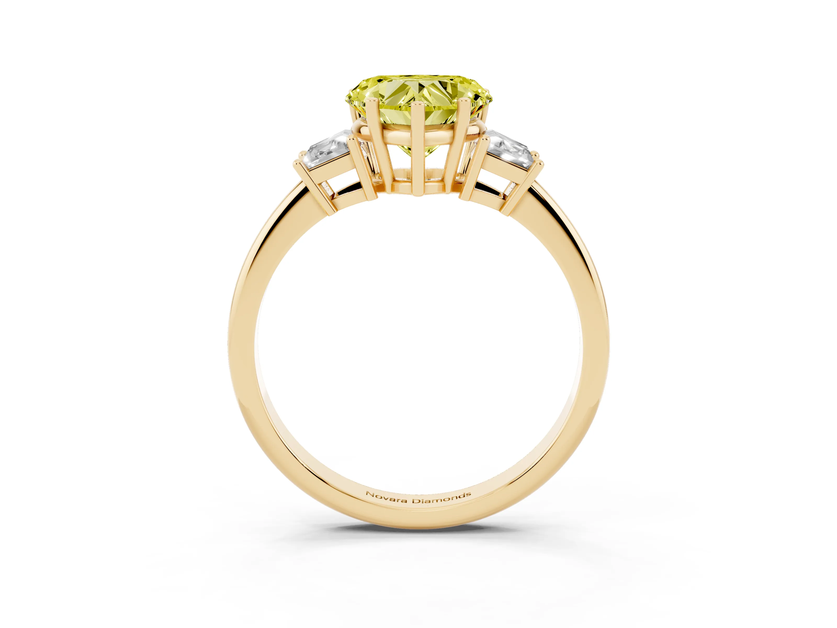 Fancy Yellow Heart Cut Diamond Three-Stone Ring Set in Yellow gold with Trapezoid Side Stones and Prong Setting