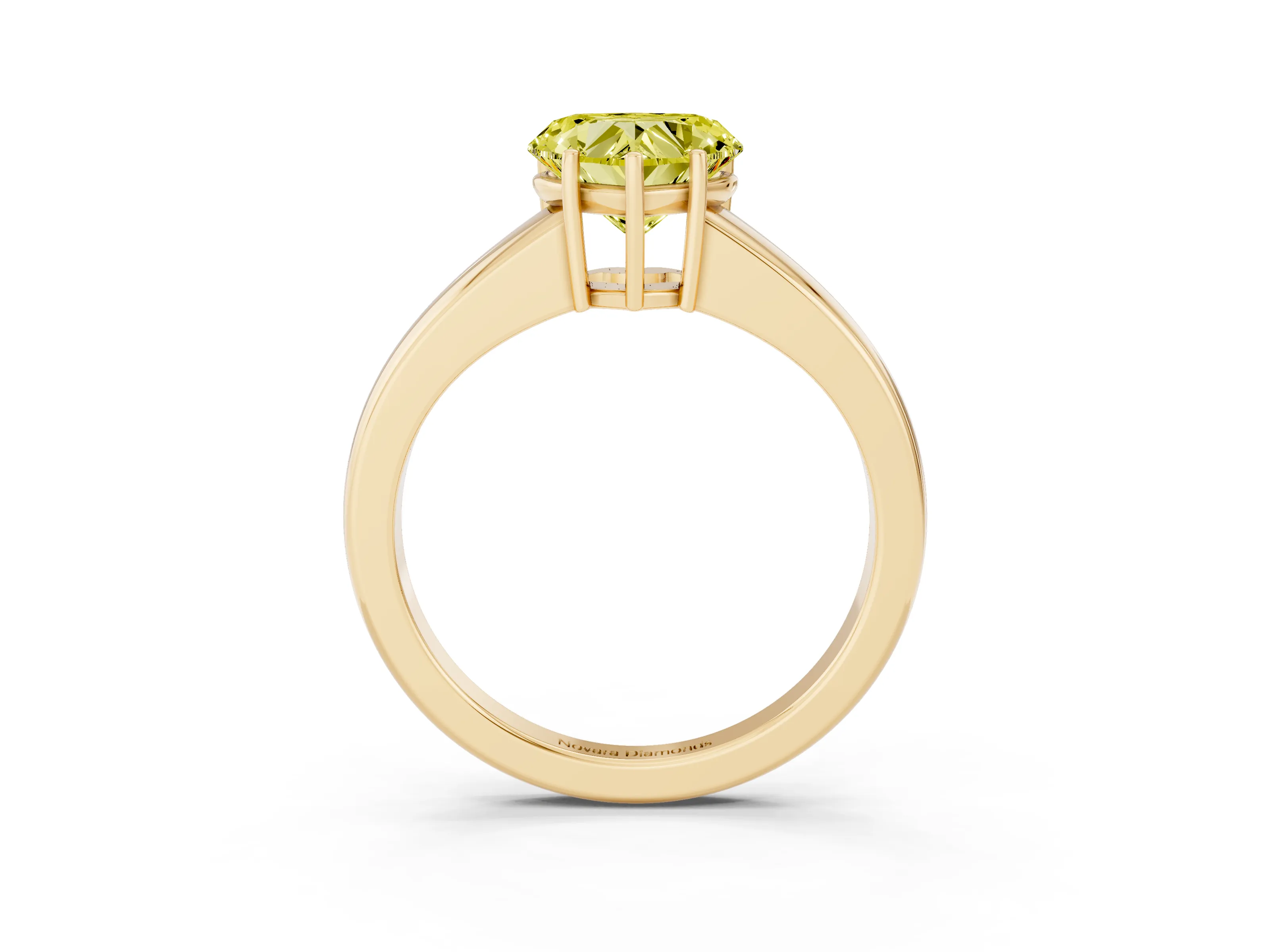 Fancy Yellow Heart Cut Diamond Solitaire Ring Set in Yellow gold with Tapered Band and Prong Setting