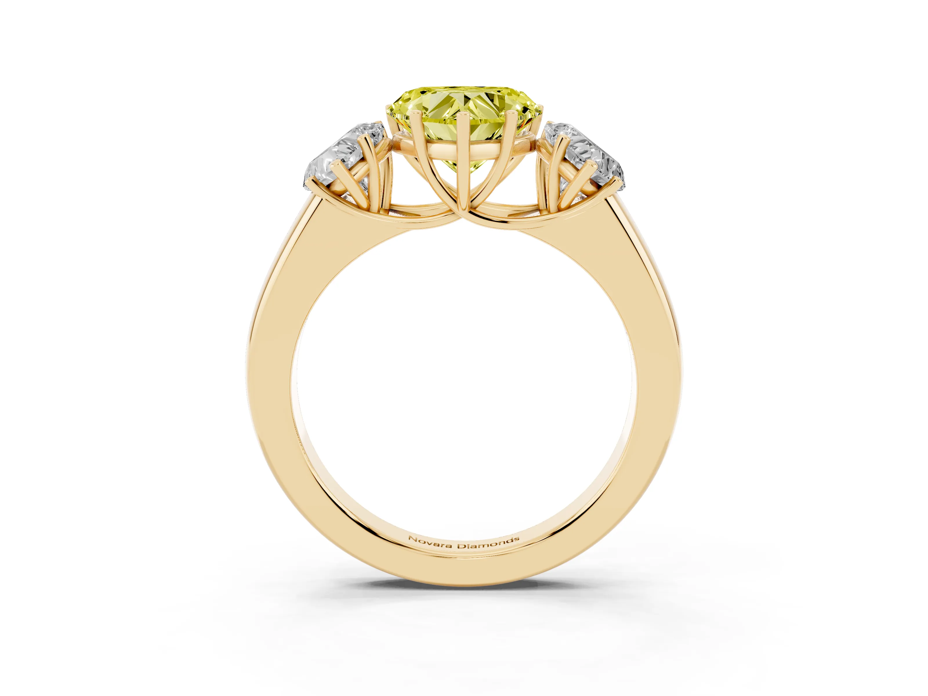 Fancy Yellow Three-Stone Heart Cut Diamond Ring Set in Yellow gold with Matching Prong Settings and Plain Band
