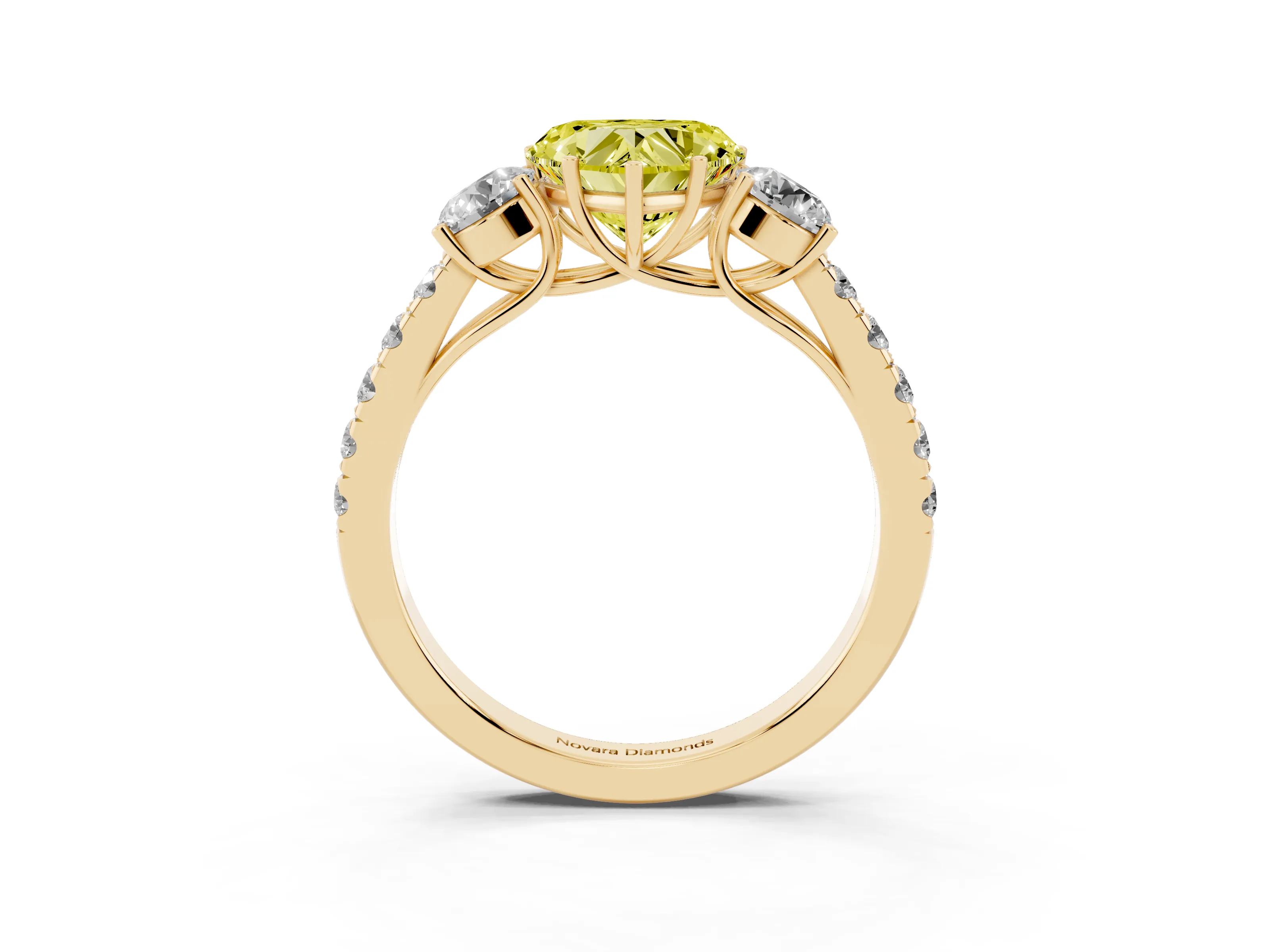 Fancy Yellow Heart Cut Diamond Three-Stone Ring Set in Yellow gold with Round Side Stones and Delicate Pavé Band