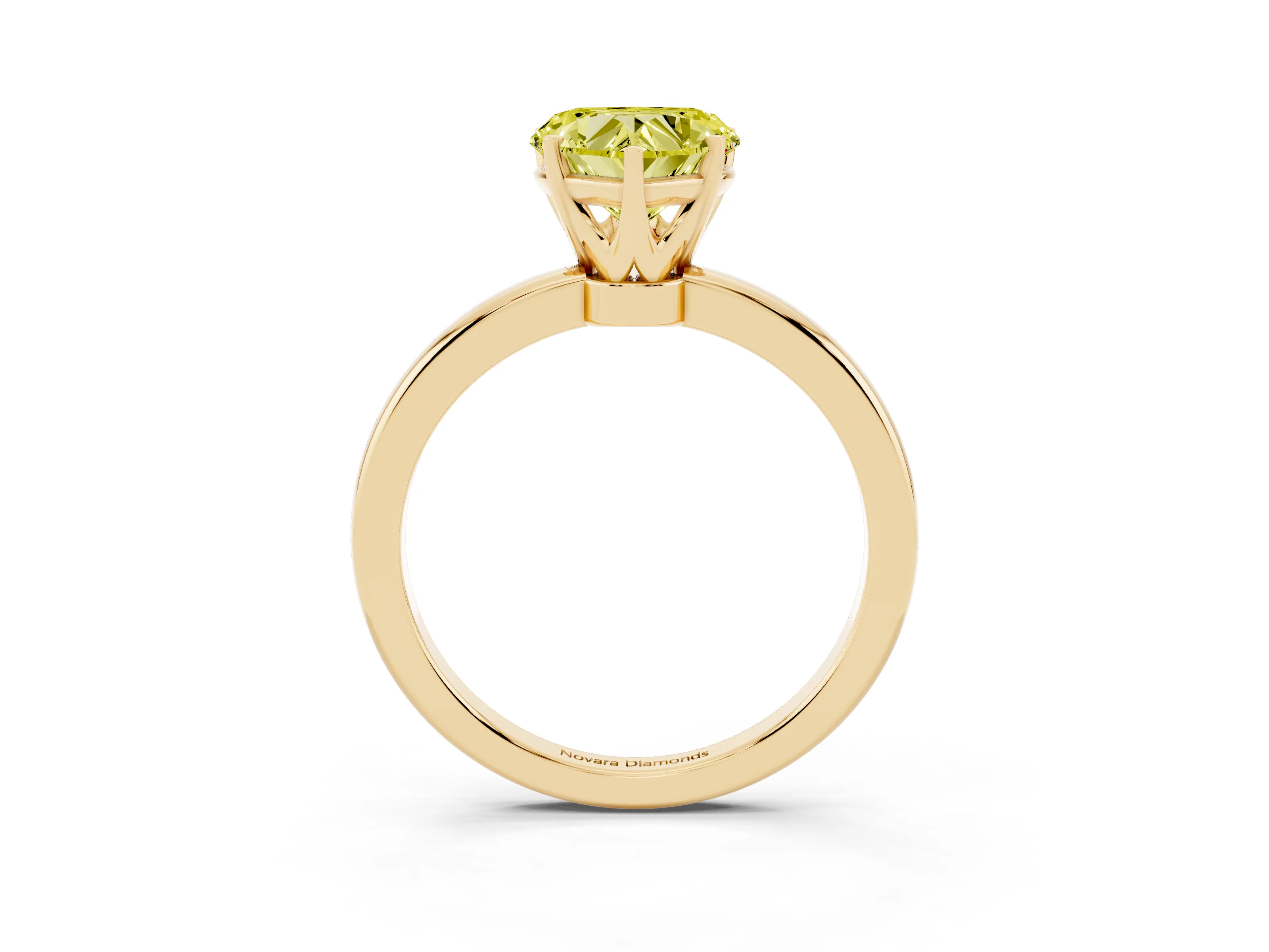 Fancy Yellow Heart Cut Diamond Solitaire Ring Set in Yellow gold with Raised Prong Setting on a Classic Band