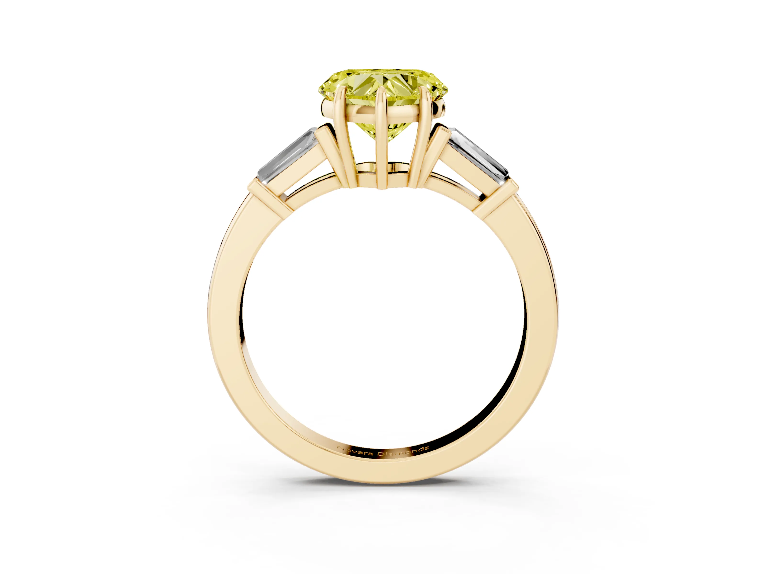 Fancy Yellow Heart Cut Diamond Three-Stone Ring Set in Yellow gold with Tapered Baguette Side Stones and Prong Setting